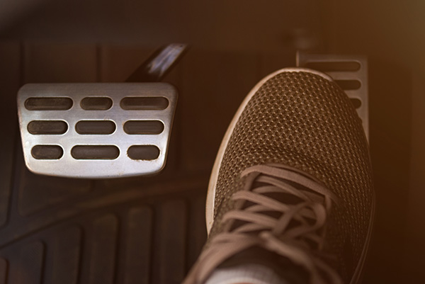 Why Your Car Hesitates When You Press the Gas Pedal