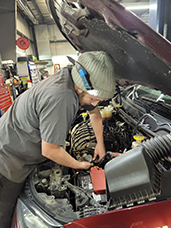 Tom's Auto Center - Brayden Our Mechanical Specialist Isaac B. Checks Vehicle at Tom’s Auto Center